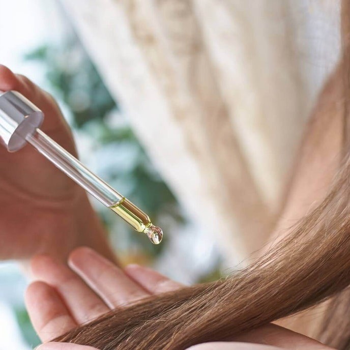 how often should i put oil in my hair